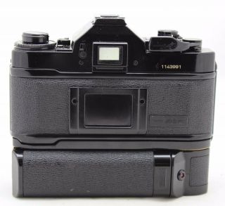 Canon A 1,  vintage 35mm SLR camera,  lens FD 50mm 1:1.  8 & Power Winder A 3