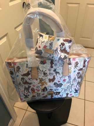 Disney Dooney And Bourke Dog Tote With Matching Cosmetic Case.