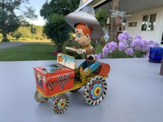 Neat Vintage Tin Wind Up Unique Art Rodeo Joe Crazy Car.  Great Piece