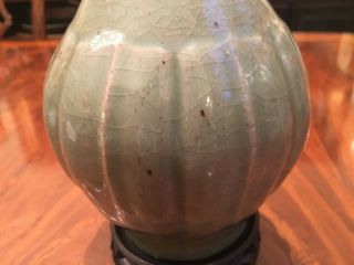 A Rare Chinese Ming Dynasty Celadon Vase With Wooden Stand.