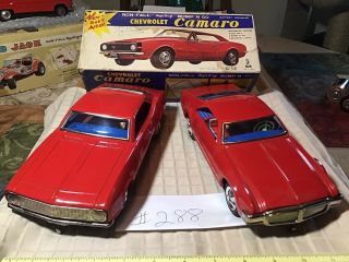 (2) Vintage Tin Battery Operated Cars Chevy Camaro & Oldsmobile Toronado 1960s