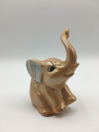 Vtg Porcelain Peach Orange Lusterware Sitting Baby Elephant Figurine Trunk Up