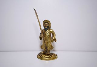 A Gilt Bronze Figure of Guanping with a Box 2