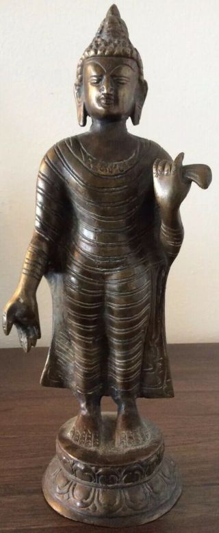 An Antique Sino Tibetan Bronze Standing Buddha Statue,  Patina,  12”