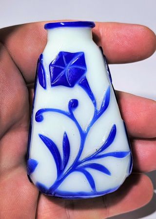Antique Chinese Carved Peking Glass Blue Overlay White Snuff Bottle