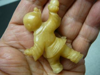 Finely carved Chinese yellow jade figures a boy and a girl,  late 19th C 2