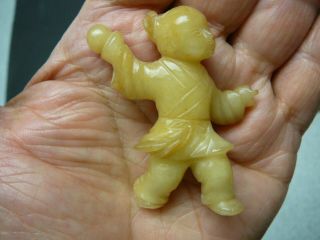 Finely carved Chinese yellow jade figures a boy and a girl,  late 19th C 3