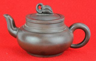 Vintage Chinese Terra Cotta Yixing Teapot.  3” Tall,  6 ½” Wide.  (bi Mk/180714)