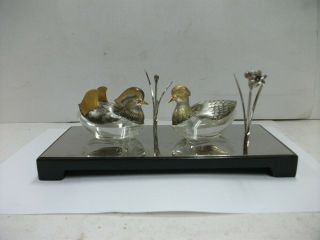 Seasoning Case Of The Sterling Silver Mandarin Duck.  And Sterling Silver Flower.