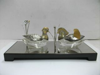 Seasoning case of the Sterling Silver mandarin duck.  and Sterling Silver flower. 3
