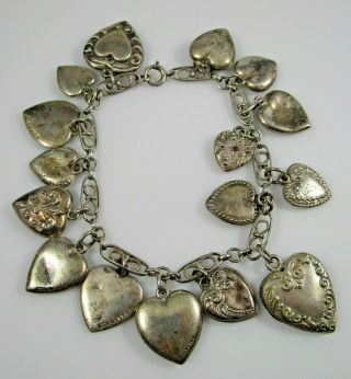 Puffy Heart Charm Bracelet Sterling Silver 16 Charms Vintage 20.  5 Grams