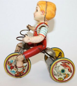 Antique Vintage Tin Litho Windup Toy Unique Art Mfg " Kiddie Cyclist " On Tricycle