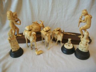 8 Old Chinese / Indian ? Carved Figures Snake Charmers Camels Baggage