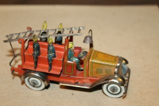 VINTAGE 1920 ' s TIN LITHOGRAPH WIND UP PENNY TOY FIRE TRUCK with FIVE FIREMEN 2