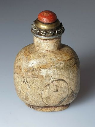 A Stunning Qing Dynasty Pudding Stone Snuff Bottle With Silver & Coral Stopper