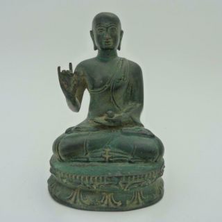 Antique Chinese Bronze Figure Of A Seated Monk Holding The Pearl Of Wisdom