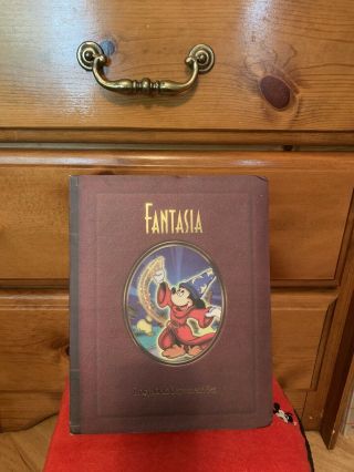 Walt Disney World Fantasia Storybook Ornaments (7) Set.
