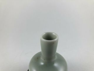 An antique Chinese Celadon glazed miniature porcelain vase 2