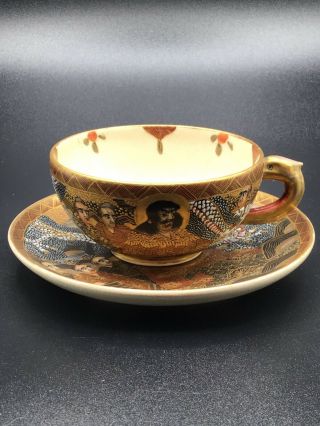 Japanese Antique Satsuma Immortals And Dragon Teacup And Saucer Raised Enamel