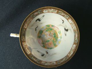 Fine Meiji Kutani Porcelain Cup and Saucer - - Cranes,  Immortals,  Geishas - - Signed 2