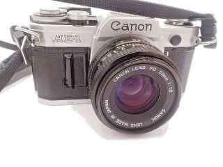 Canon Ae - 1 Slr 35mm Film Camera W/ 50mm 1.  4 Detachable Lens And Strap - Vintage