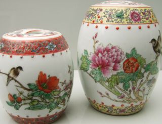 Two Chinese Famille Rose Porcelain Barrel Shaped Jars And Covers