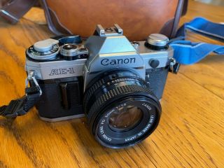 Vintage Canon Ae - 1 35mm Film Camera With Three Lenses And Accessories