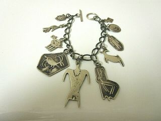 Vintage Ray Tracey Knifewing Navajo Sterling Charm Bracelet.  7 1/2 "