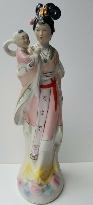 Chinese vintage porcelain figure of a female with child 2
