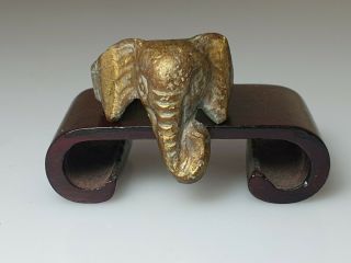 A Lovely Qing Dynasty Gilt Metal Ring In The Form Of An Elephants Head