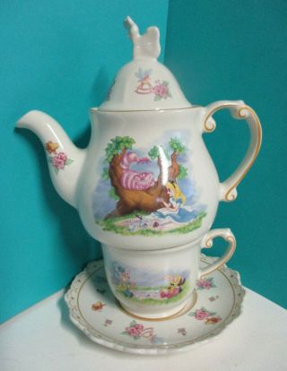 Disney Alice In Wonderland Tea Pot,  Cup And Saucer,  Saucer Has Been Repaired
