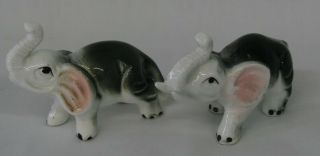 Vintage Pair (2) Small Vintage Porcelain Painted Elephants Figurine Trunk Up