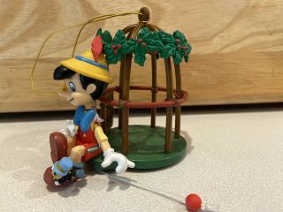 Enesco Pinocchio with Jiminy Cricket Nose Caged Christmas Ornament Disney 2