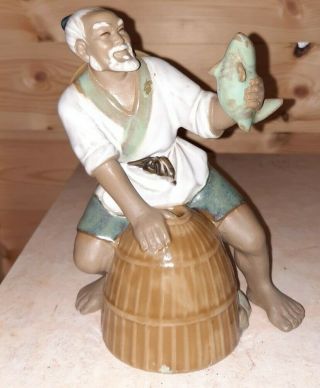 Vintage Chinese Mud Man Figurine.