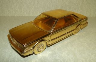 Vintage Nissan Bluebird Cigarette Holder Gold Metal Car Model Music Box