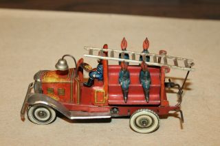 VINTAGE 1920 ' s TIN LITHOGRAPH WIND UP PENNY TOY FIRE TRUCK with FIVE FIREMEN 2 2