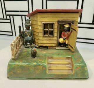 " Uncle Remus " Mechanical Coin Bank Cast Iron " Book Of Knowledge "