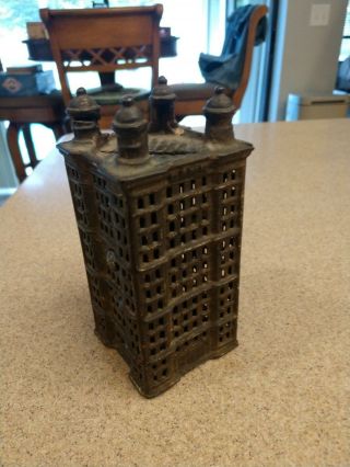 Vintage Cast Iron Skyscraper Coin Bank Building 5 1/2 " Tall W/ 4 Turret Towers