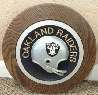 Vintage 1970’s Oakland Raiders 14” Round Football Helmet Plaque