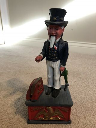 Mechanical Cast Iron Uncle Sam Coin Bank: