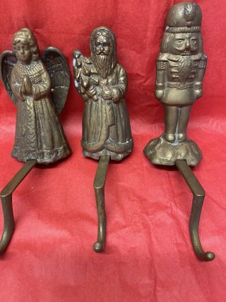Vintage Set Of 3 Heavy Brass Santa Angel Nutcracker Christmas Stocking Holders