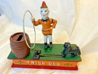 Vintage Cast Iron Mechanical Bank Clown Trick Dog Hand Paint Complete Coin Plug
