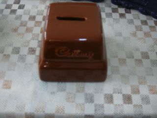 3 cadburys money boxs very rare items.  train,  car & chock block.  by wade. 3