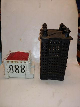 2 Vintage 30s Cast Iron Building Banks,  6 Turret Skyscraper,  Red And White 