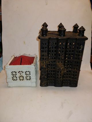 2 Vintage 30s Cast Iron Building Banks,  6 Turret Skyscraper,  Red And White 