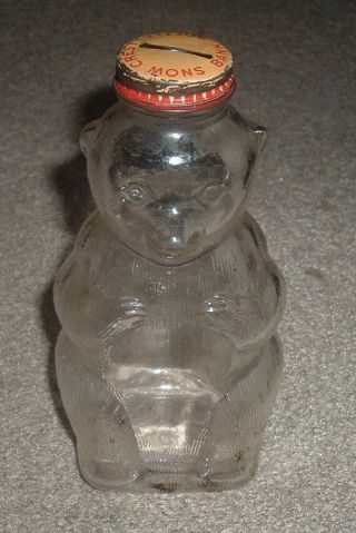 Vintage 1950s Snow Crest Glass Bear Coin Bank Bottle Yellow Lid Salem Mass 7 "