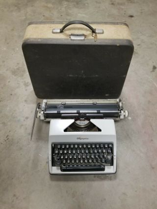 Vintage Olympia DeLuxe Portable Typewriter W/Case 2