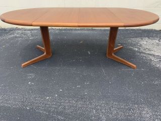 Danish Modern Expandable Teak Dining Table With Two Leafs