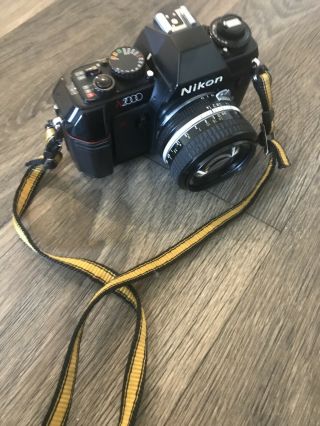 Vintage Nikon N2000 Camera With 50 Mm Lens With Accessories