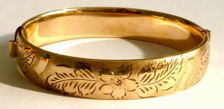 A Vintage 1950s 1/5th 9ct Rolled Gold Opening Bangle With A Flower & Leaf Design